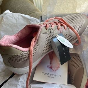 Never worn, in original box and packaging